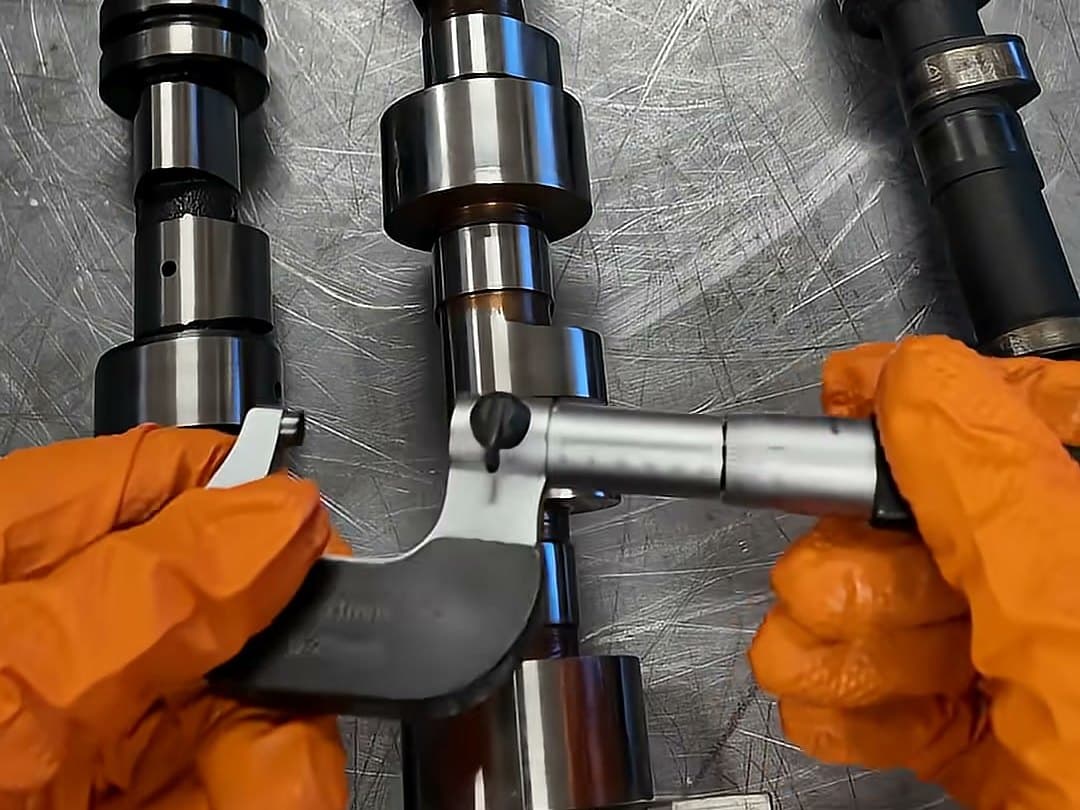 Camshaft measured with a micrometer at Meksta's workshop